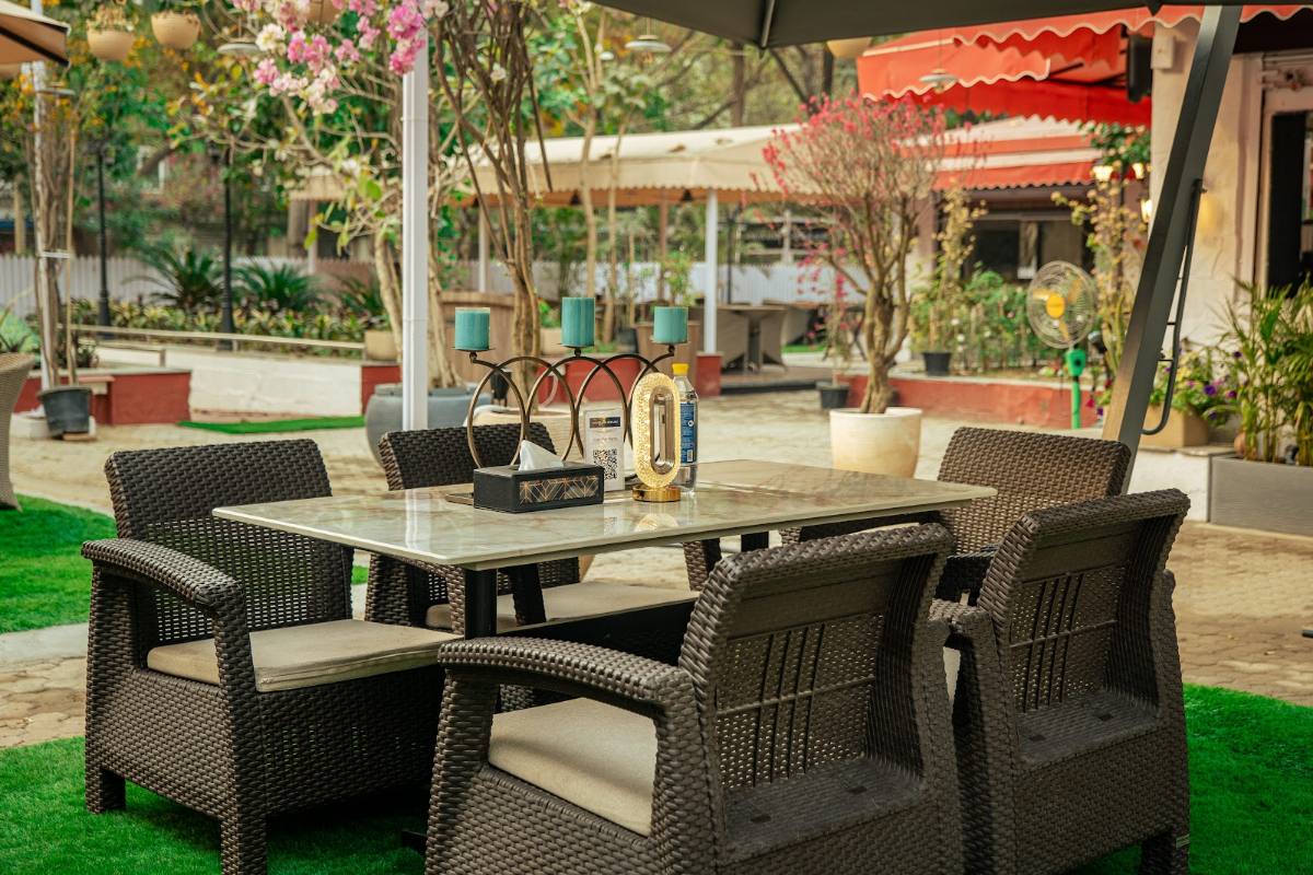 Garden seating beneath umbrellas