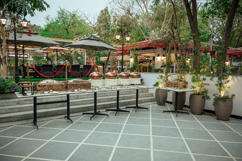 Open-air garden and buffet setting for a daytime gathering