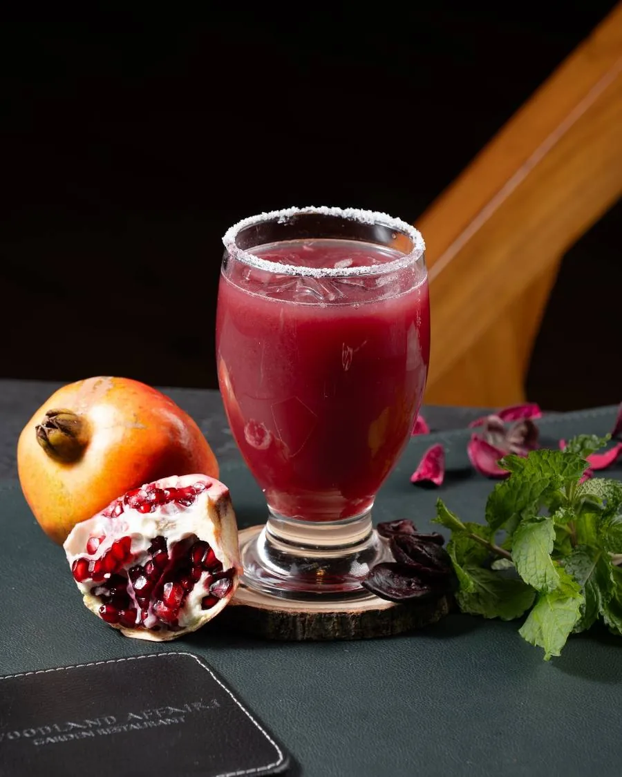 Berry cooler served with fruit and ice