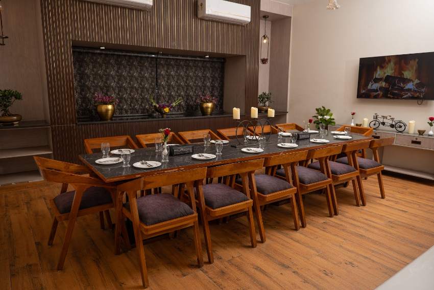 Intimate indoor dining table with candles