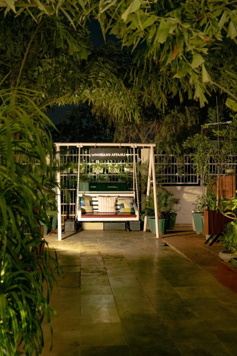 Leafy garden swing and seating for a relaxed gathering